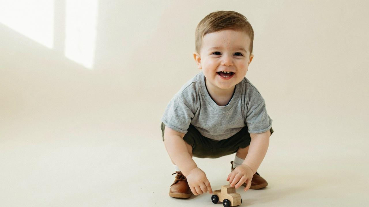 Toddler boy with a classic crew cut hairstyle.