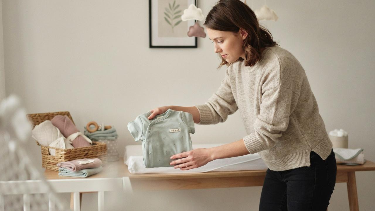 Folding baby sleepers and footed pajamas.