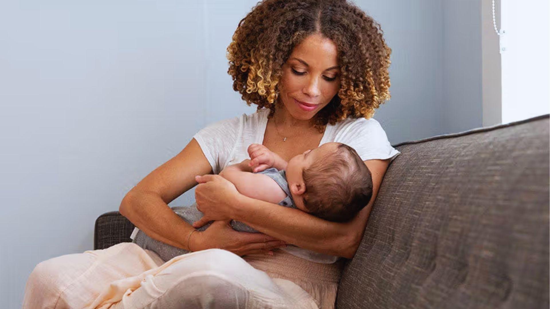 A young mother breastfeeding
