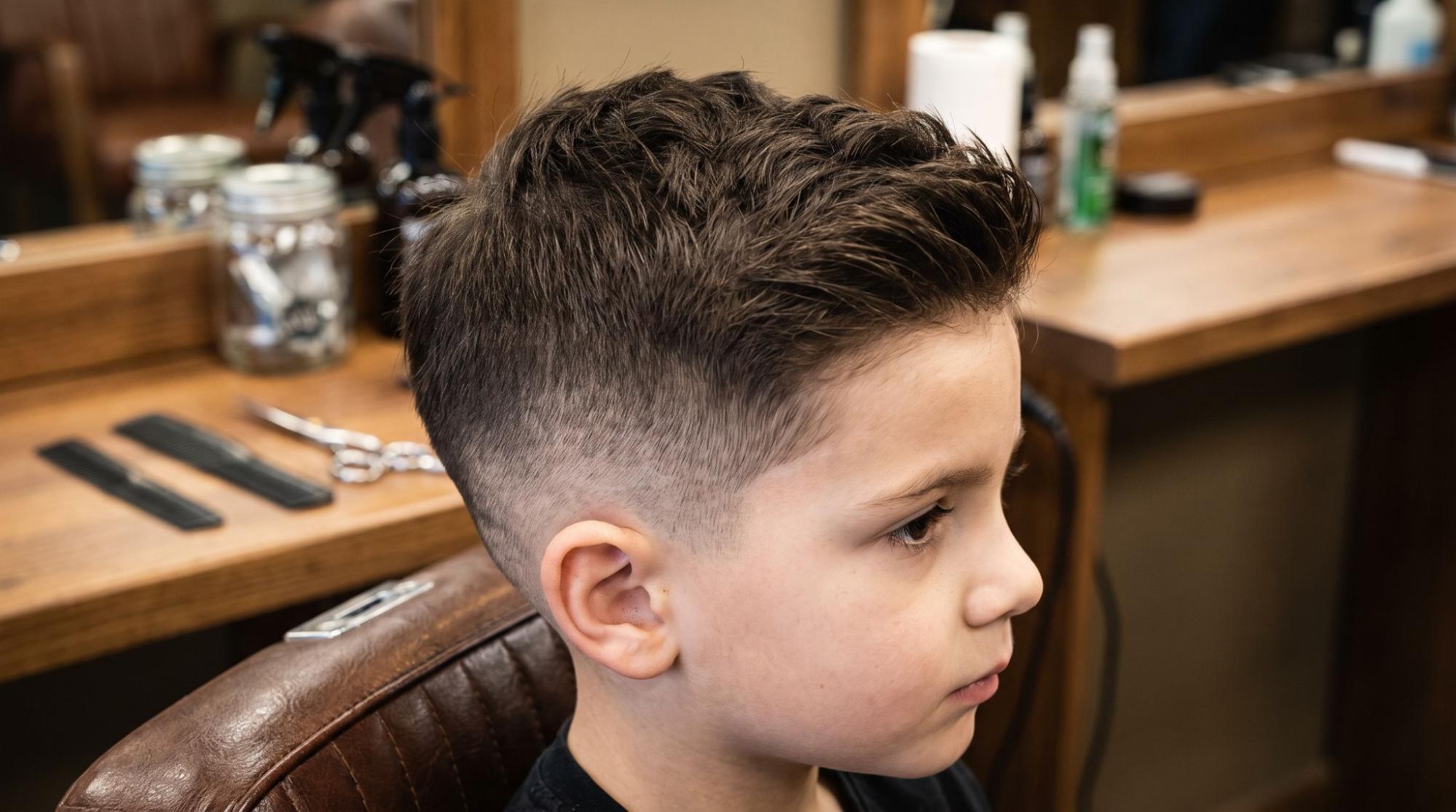 Close side view of faded sides and longer top hair