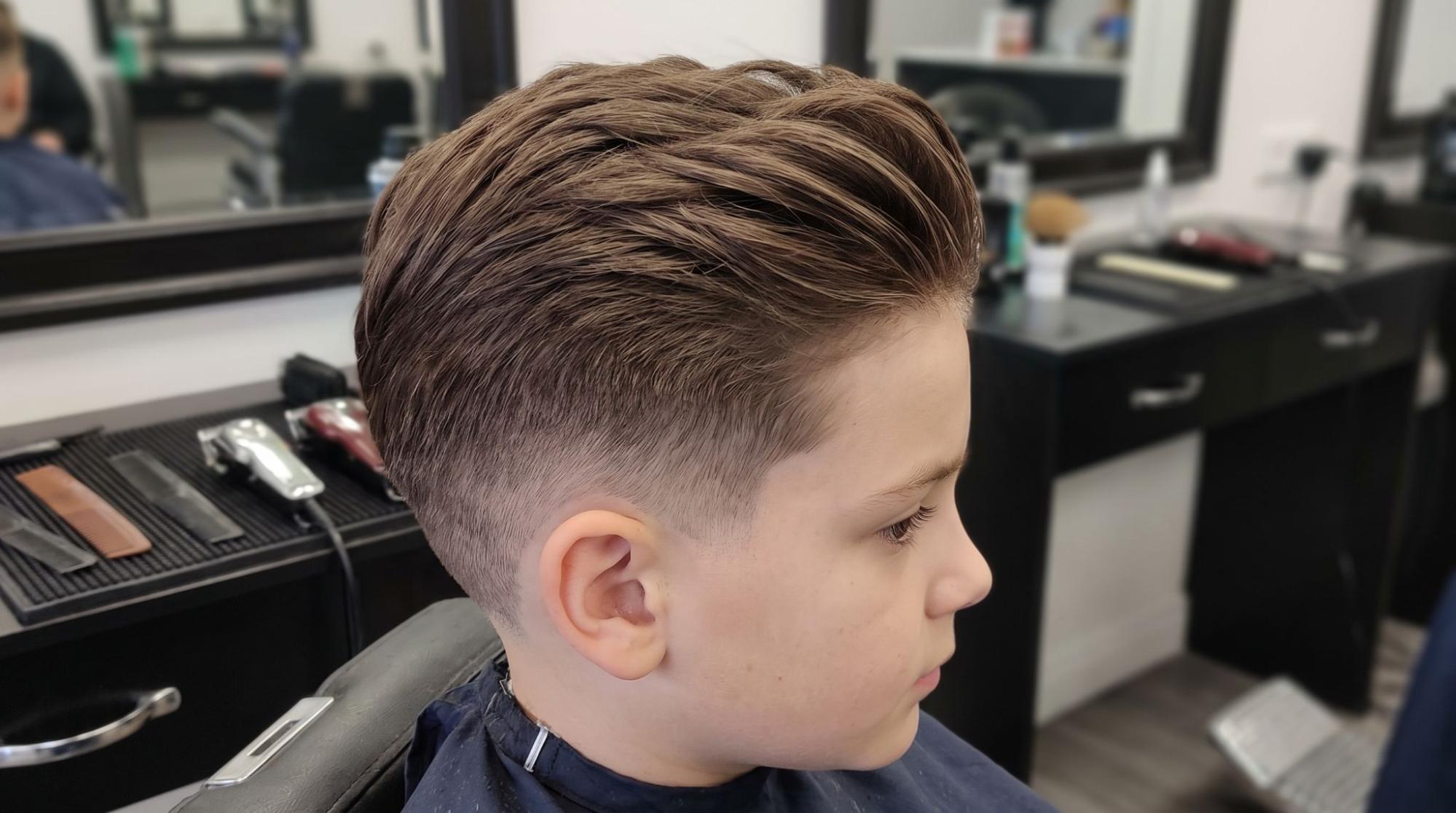 Short tapered sides with longer hair on top