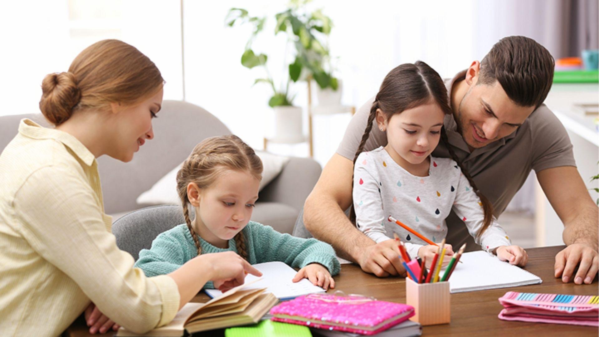 Parents help daughters with homework, showing family engagement trend in early childhood education.