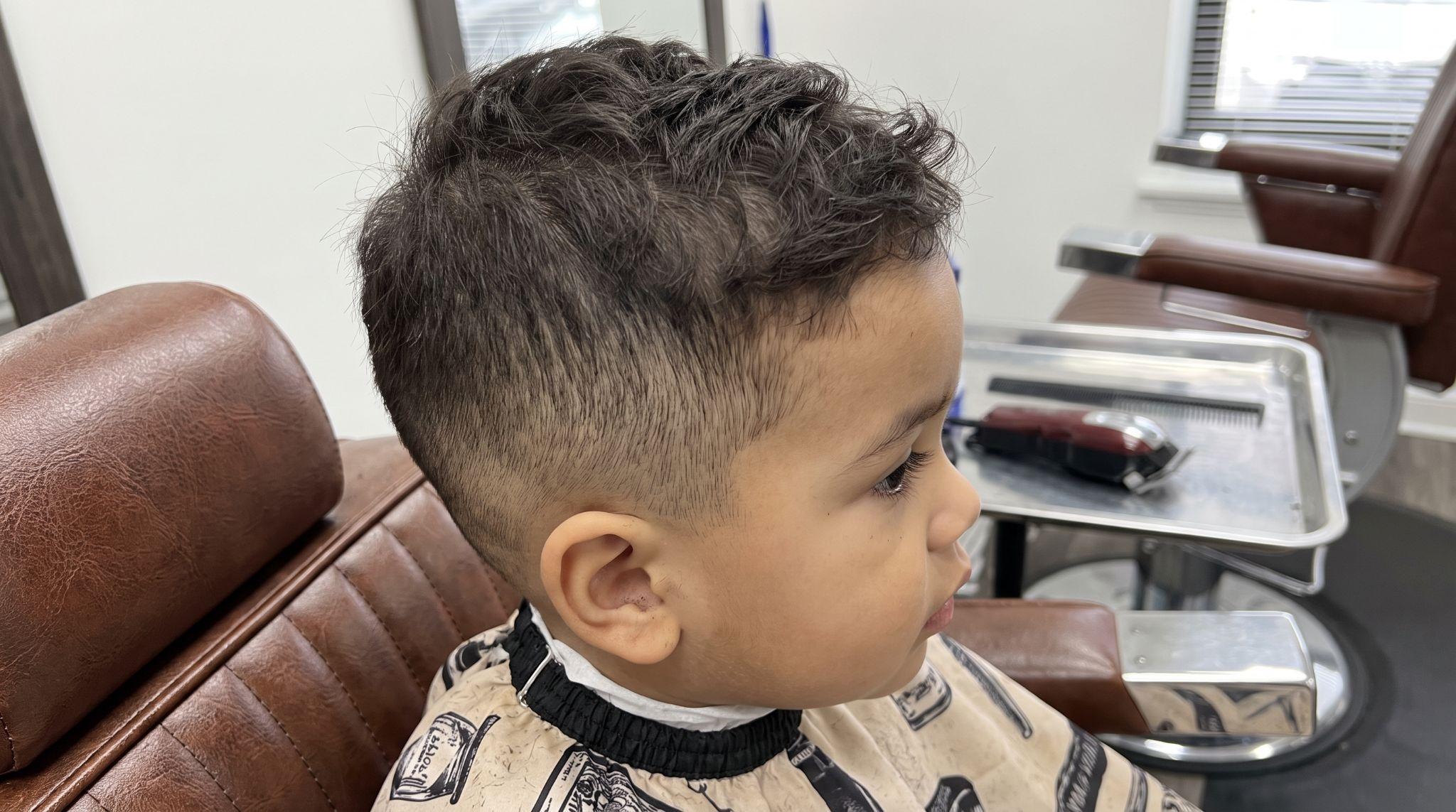 Soft fade with number two or three guard length on sides